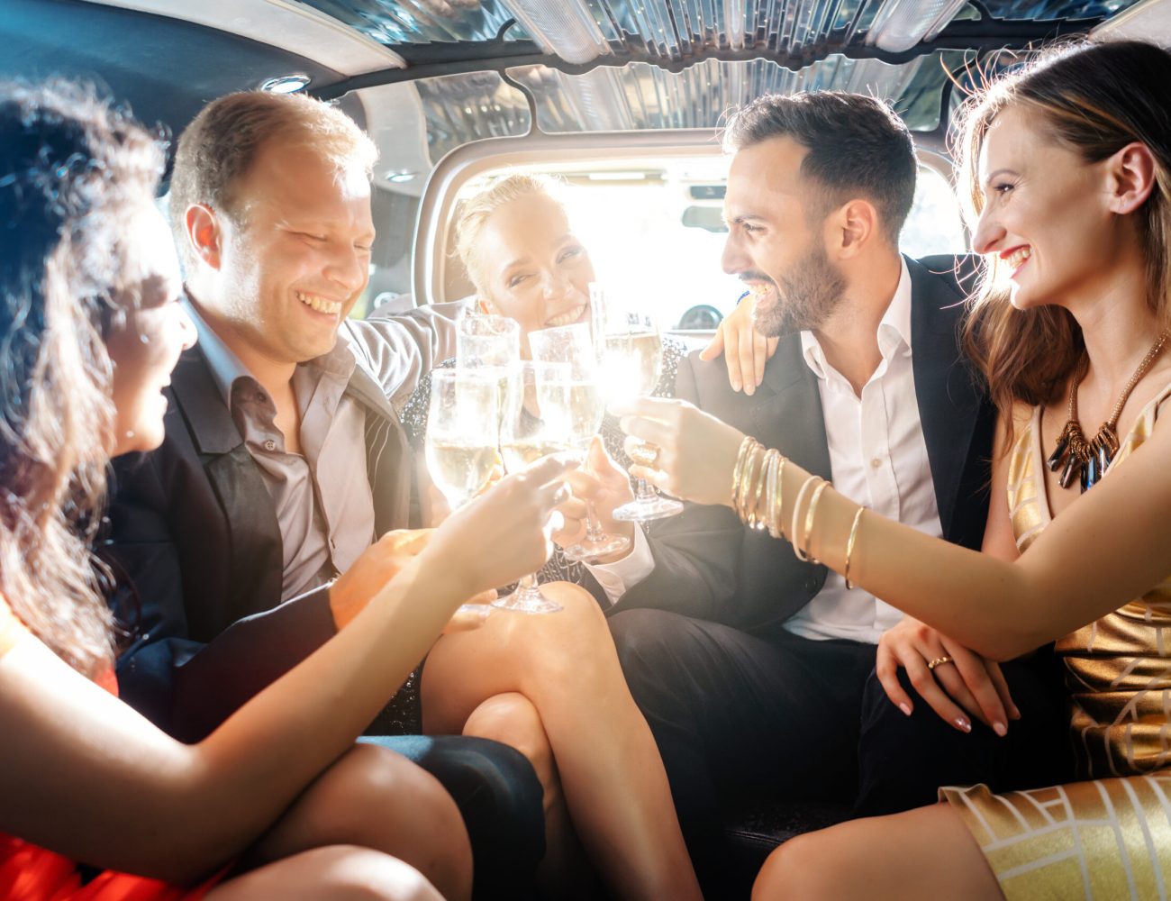 Crowd,Of,Party,People,In,A,Limo,With,Drinks,,Woman