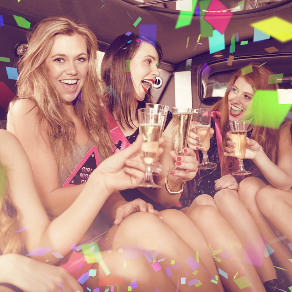 Flying,Colours,Against,Happy,Friends,Drinking,Champagne,In,Limousine